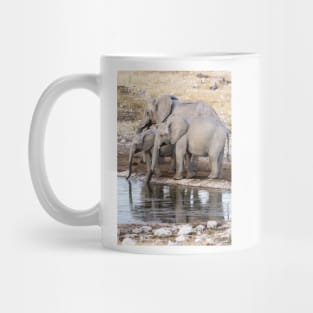 Elephants at the waterhole. Mug